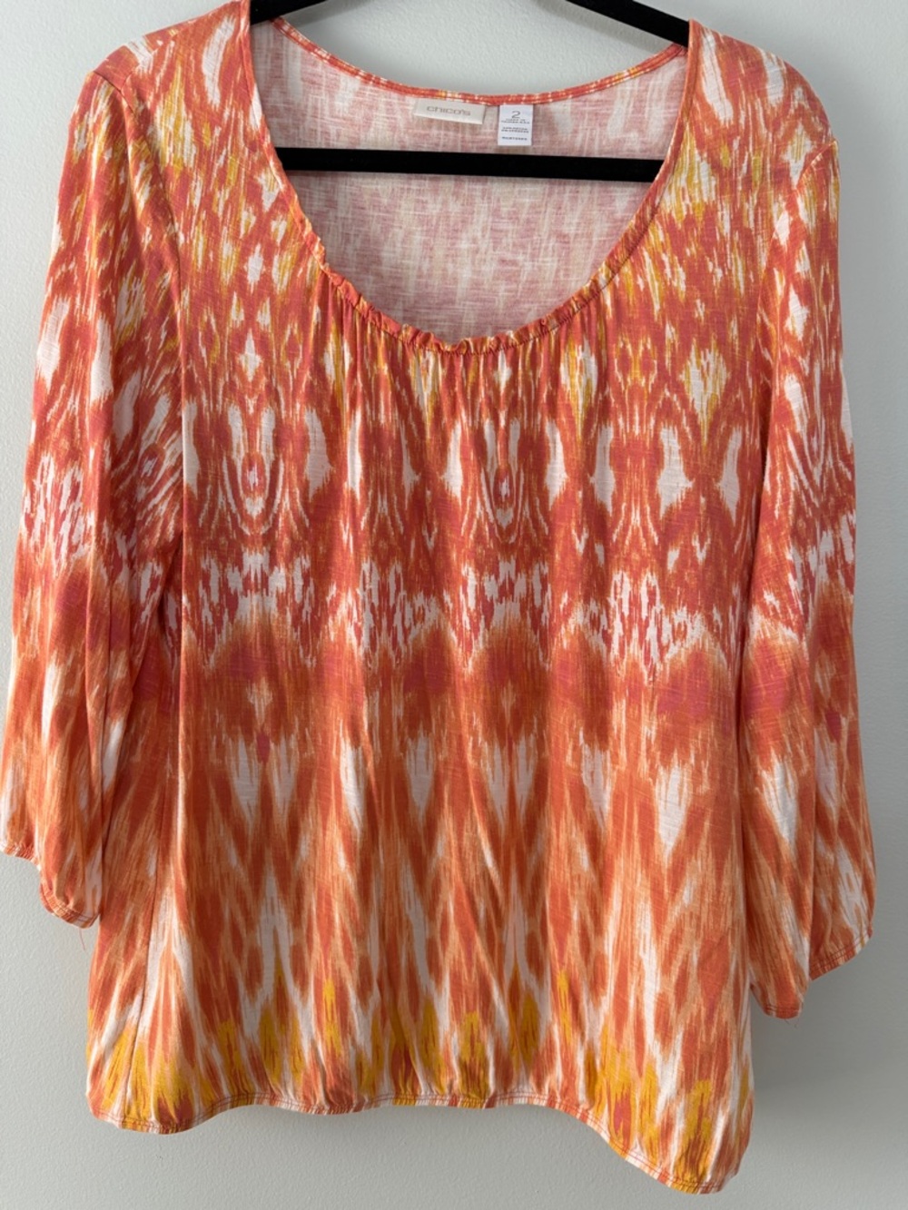 Chico’s Women’s Orange Tie-Died Patterned Scoop Neck Top, size 2 (L).